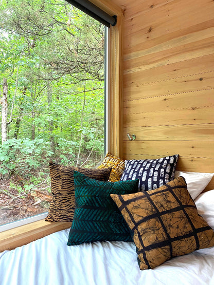 The Getaway camping. Batik textile home goods for modern Boho home, pillows made in Tanzania. Fair Trade.