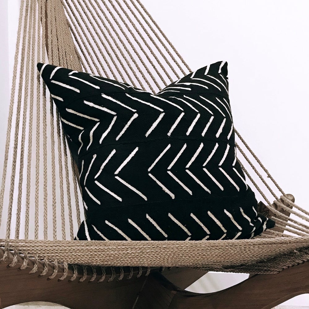 Handcrafted black mudcloth pillow with minimalist designs, made in USA, designed in Mali.