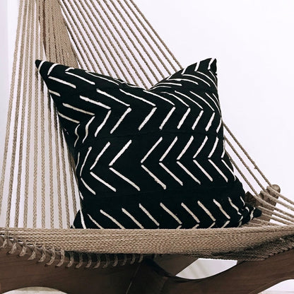 Handcrafted black mudcloth pillow with minimalist designs, made in USA, designed in Mali.