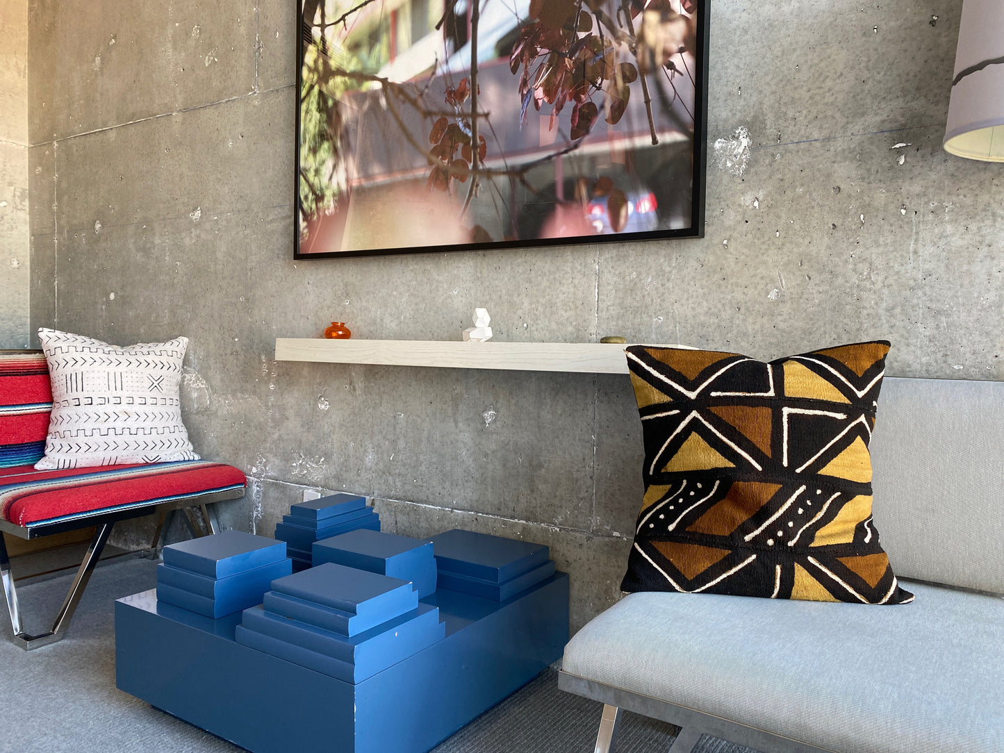 White xN Studio mudcloth pillow on modern Serape textile chair at the Line Hotel in Los Angeles, California.