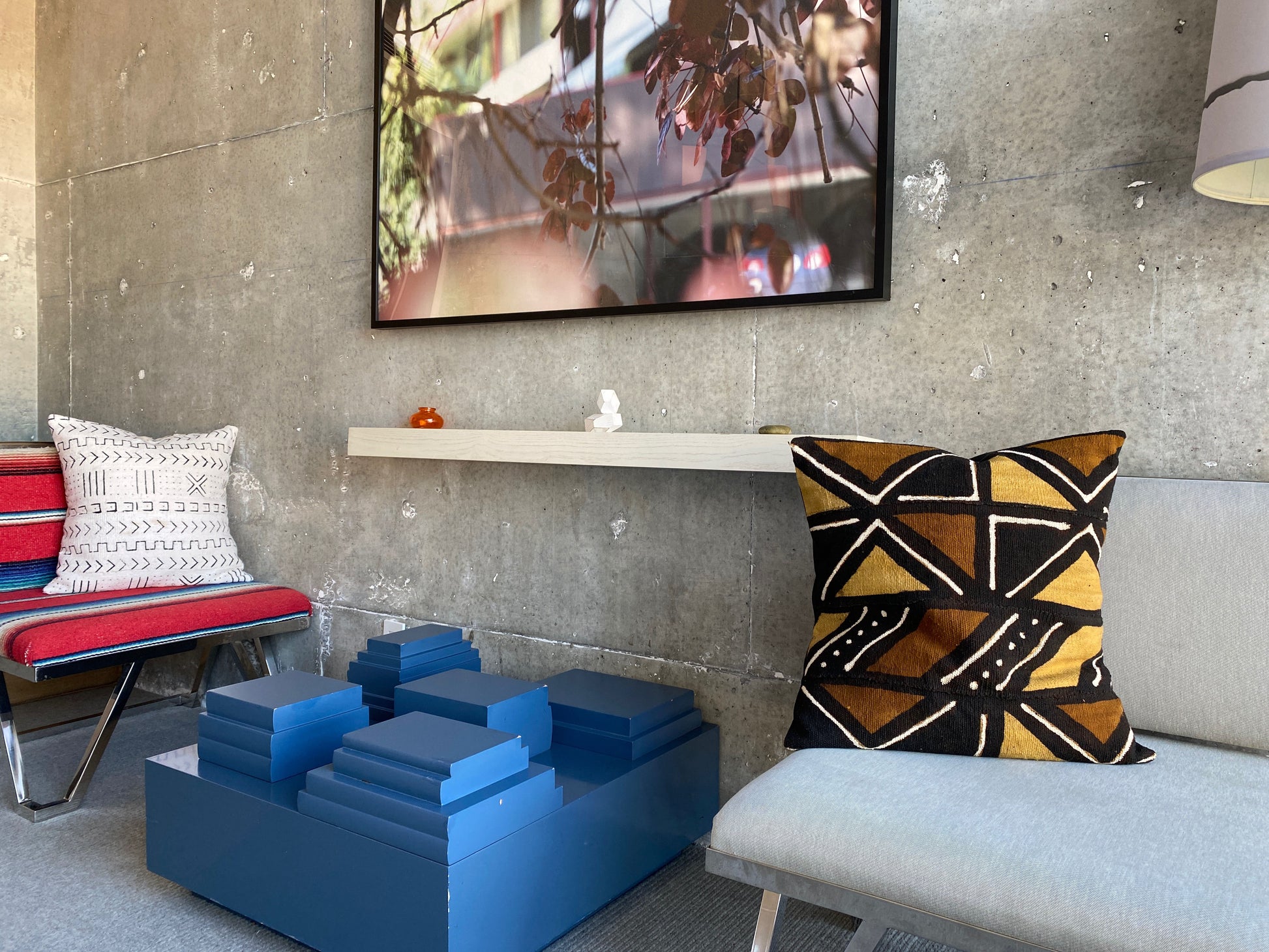 White xN Studio mudcloth pillow on modern Serape textile chair at the Line Hotel in Los Angeles, California. 