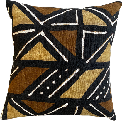 Brown, black, and white mudcloth pillows with geometric designs styled on Scandinavian bench. Modern pillows made in USA, designed in Mali